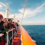 Travelers enjoying their adventure on a freighter at sea.